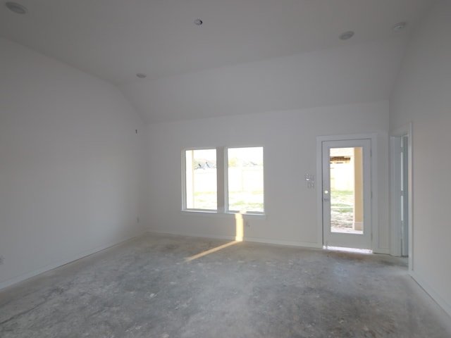 8622 Pier Cove Dr, Cypress, TX 77433 - unfurnished room featuring vaulted ceiling, healthy amount of natural light, and baseboards