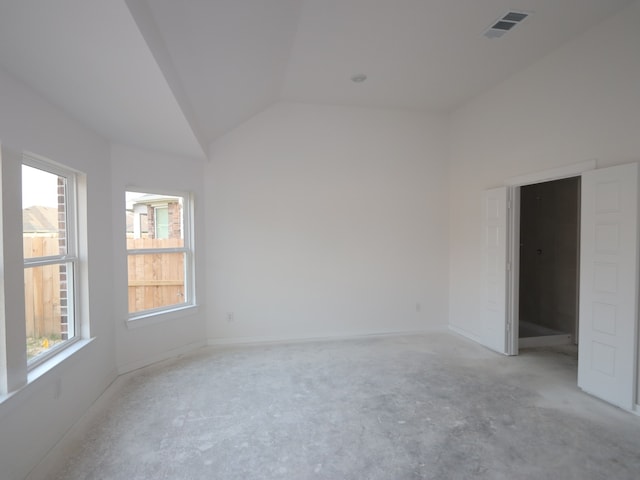 8622 Pier Cove Dr, Cypress, TX 77433 - unfurnished room featuring vaulted ceiling and baseboards