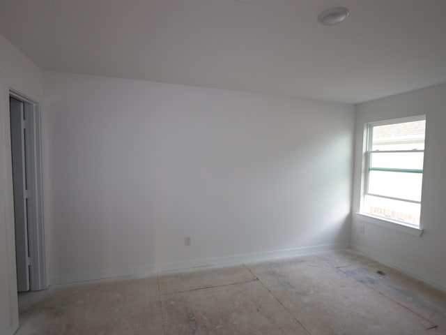 8622 Pier Cove Dr, Cypress, TX 77433 - spare room with baseboards