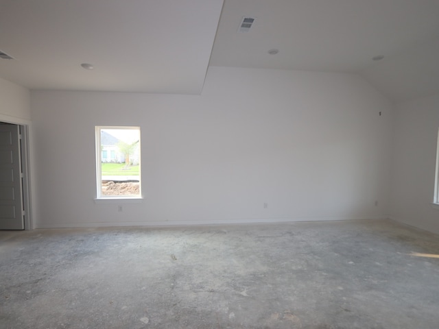 8622 Pier Cove Dr, Cypress, TX 77433 - unfurnished room featuring concrete flooring, vaulted ceiling, and baseboards