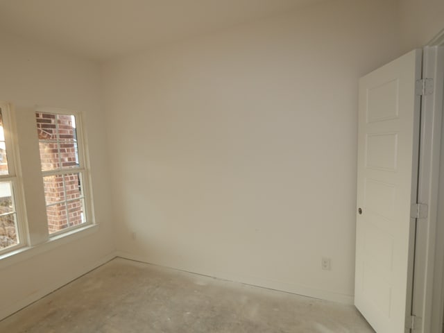 8622 Pier Cove Dr, Cypress, TX 77433 - unfurnished room with unfinished concrete floors and baseboards