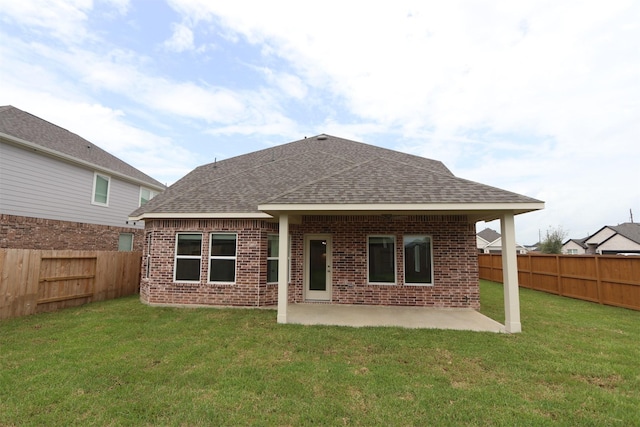 8622 Pier Cove Dr, Cypress, TX 77433 - rear view of property with a shingled roof, brick siding, a fenced backyard, and a patio area