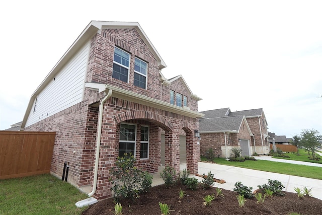 8622 Pier Cove Dr, Cypress, TX 77433 - view of front of house with brick siding, driveway, and an attached garage