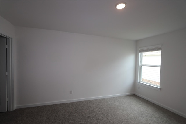 8622 Pier Cove Dr, Cypress, TX 77433 - spare room featuring carpet flooring and baseboards