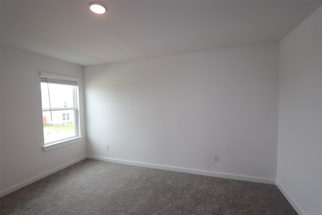 8622 Pier Cove Dr, Cypress, TX 77433 - carpeted spare room with baseboards