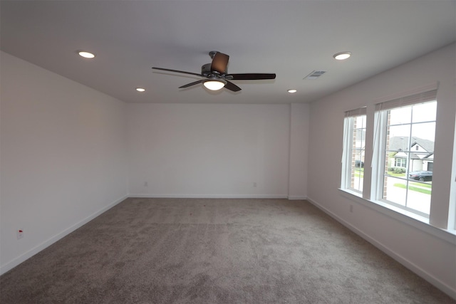 8622 Pier Cove Dr, Cypress, TX 77433 - spare room with light carpet, recessed lighting, and ceiling fan