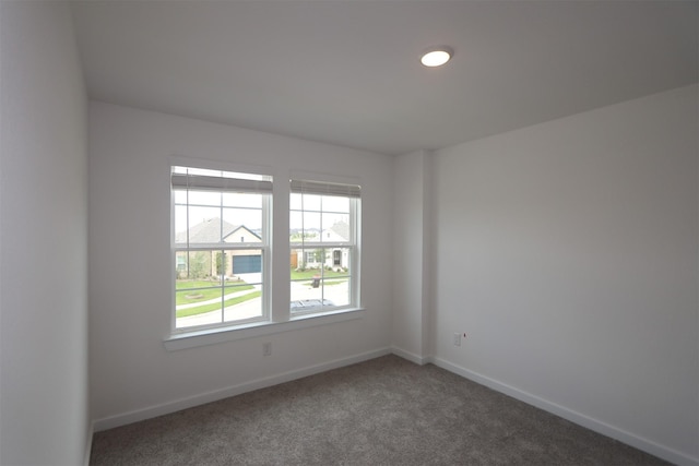 8622 Pier Cove Dr, Cypress, TX 77433 - carpeted empty room with baseboards