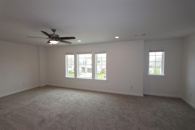 8622 Pier Cove Dr, Cypress, TX 77433 - carpeted spare room with healthy amount of natural light, ceiling fan, and recessed lighting