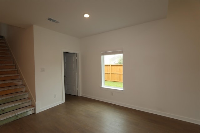 8622 Pier Cove Dr, Cypress, TX 77433 - empty room featuring wood finished floors, stairs, and recessed lighting