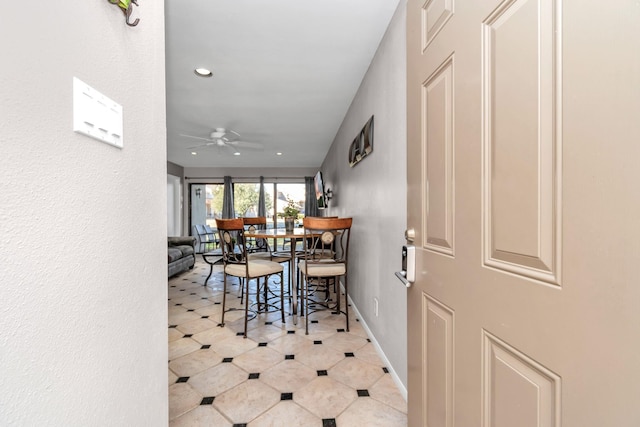 dining room with recessed lighting, a ceiling fan, and baseboards