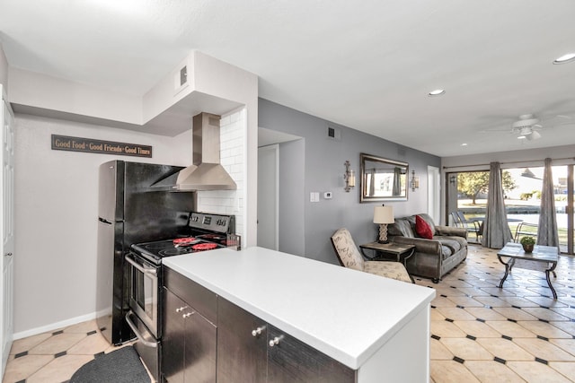 kitchen featuring electric range, a ceiling fan, open floor plan, wall chimney range hood, and a peninsula