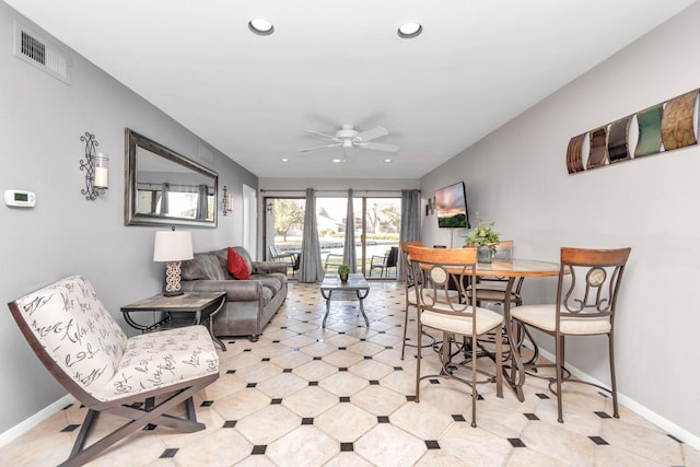 living area featuring a ceiling fan, recessed lighting, visible vents, and baseboards