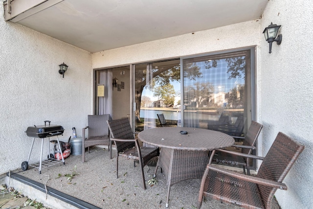 view of patio featuring outdoor dining space