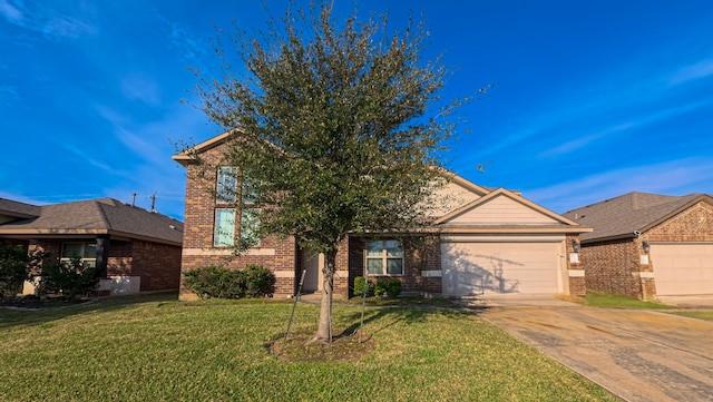 view of front of home featuring driveway, brick siding, an attached garage, and a front yard