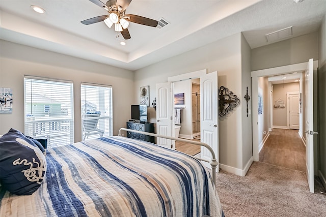 bedroom with attic access, visible vents, baseboards, light colored carpet, and recessed lighting