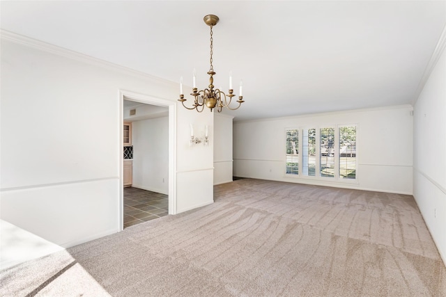 unfurnished room with carpet, ornamental molding, and a notable chandelier