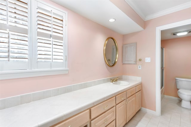 full bathroom featuring toilet, ornamental molding, vanity, tile patterned flooring, and baseboards