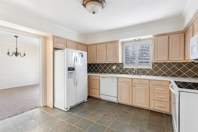 kitchen with dark colored carpet, white appliances, and light brown cabinetry