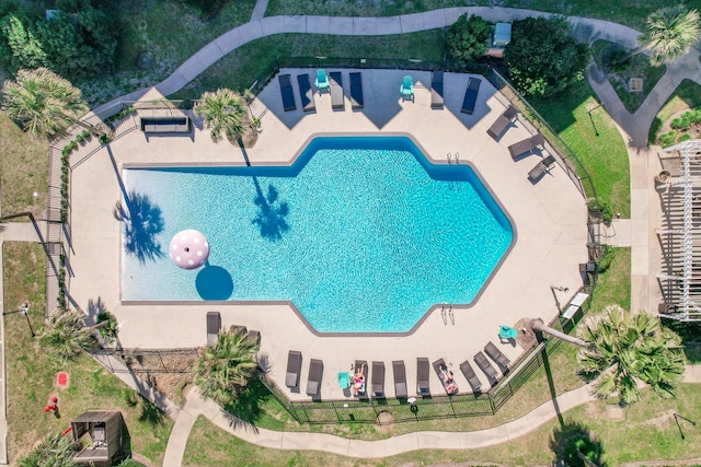 community pool featuring a patio area