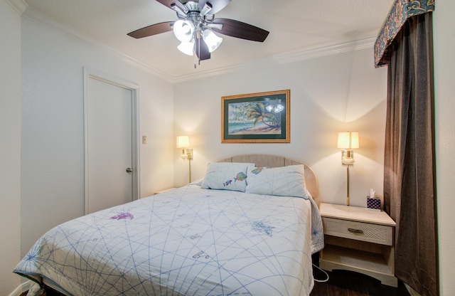 bedroom featuring ceiling fan and crown molding