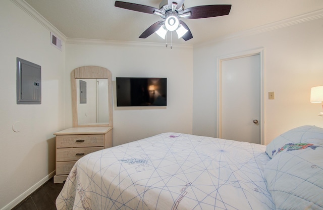 bedroom with visible vents, baseboards, electric panel, and crown molding