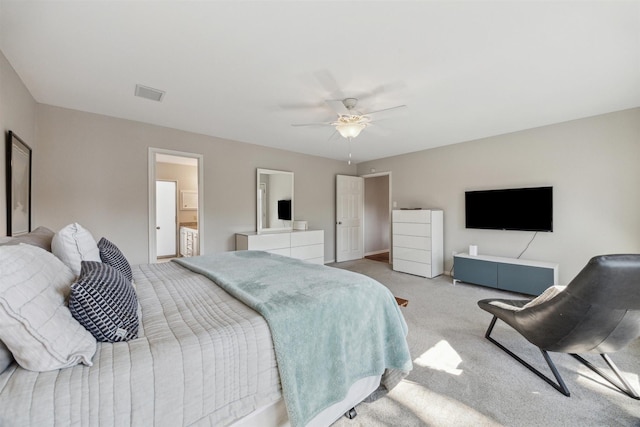 bedroom with carpet, visible vents, and a ceiling fan