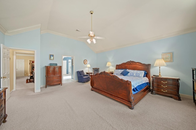 carpeted bedroom featuring baseboards, lofted ceiling, ceiling fan, and crown molding