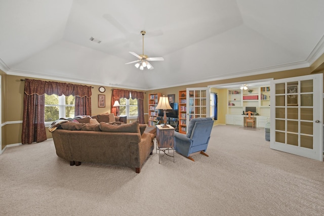 living area with lofted ceiling, ceiling fan, french doors, crown molding, and light colored carpet