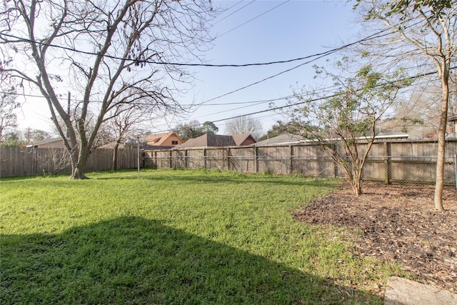 view of yard featuring a fenced backyard