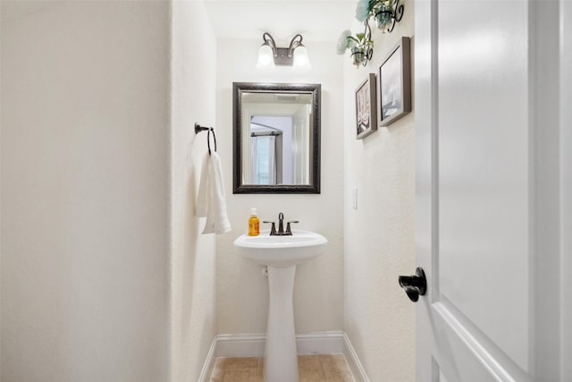 bathroom with baseboards