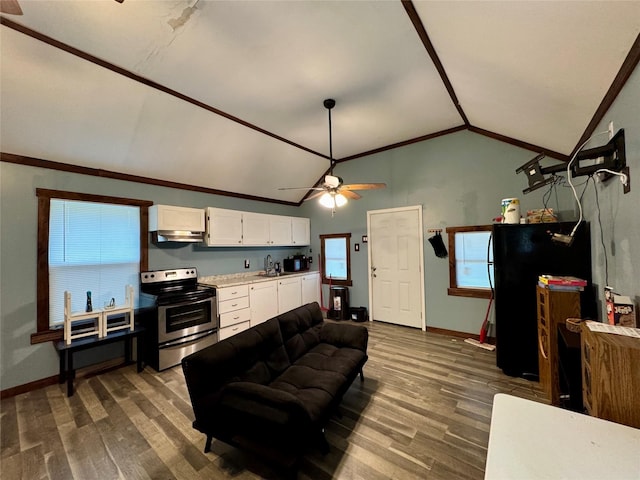 living room with lofted ceiling, dark wood-style flooring, and crown molding