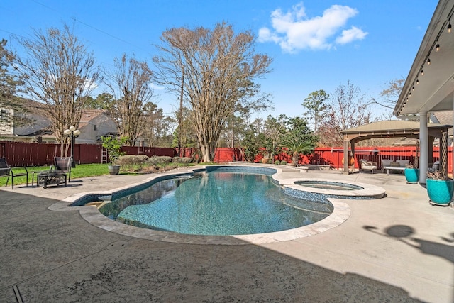 view of swimming pool featuring a gazebo, a fenced backyard, and a patio