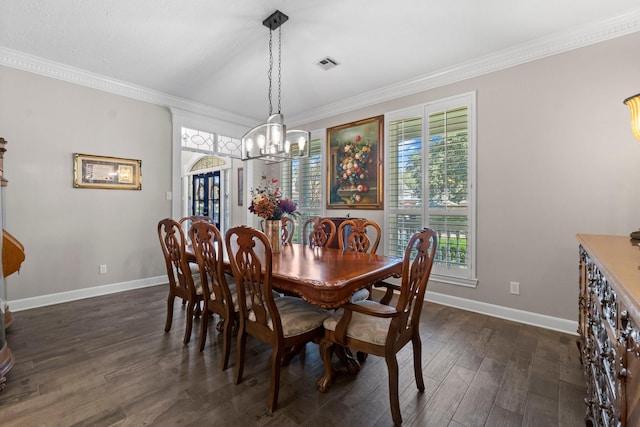 dining area with dark wood-style floors, a healthy amount of sunlight, visible vents, and ornamental molding