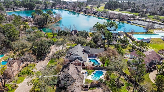 drone / aerial view with a water view