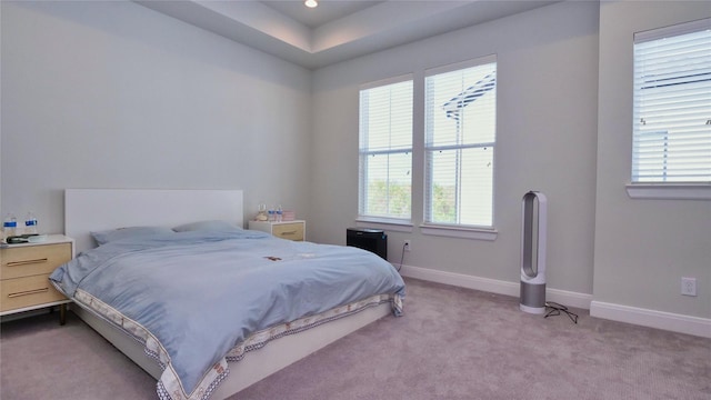 bedroom featuring carpet flooring and baseboards