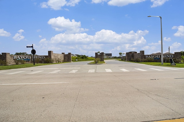 4427 Leslies Way, Dickinson, TX 77539 - view of concrete road featuring street lights