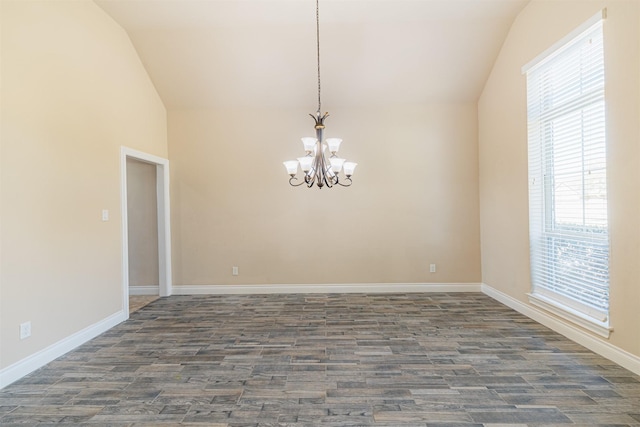 23403 Clark Arbor Ln, Katy, TX 77493 - unfurnished room with dark wood-type flooring, lofted ceiling, baseboards, and an inviting chandelier