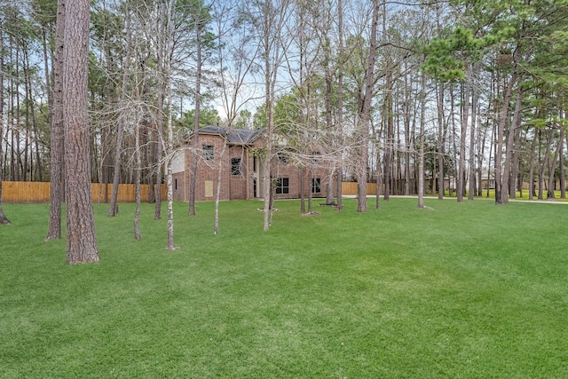 view of yard featuring fence