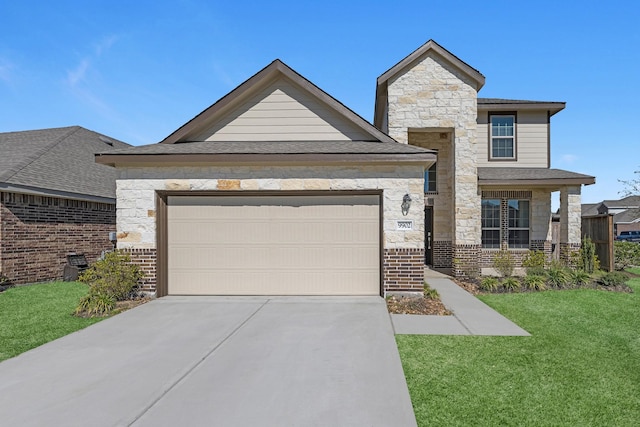 view of front of home with a garage, concrete driveway, stone siding, a front lawn, and brick siding