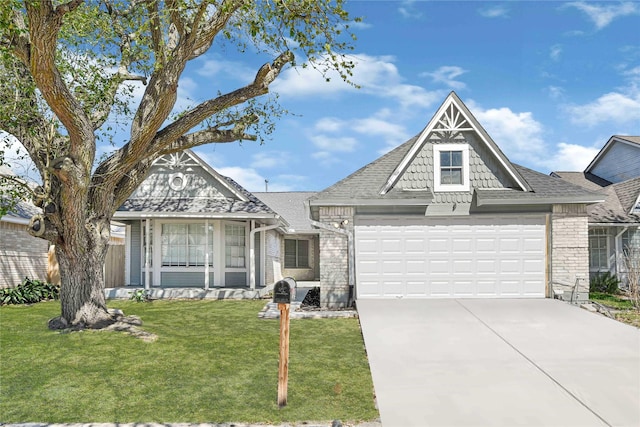 view of front of property featuring brick siding, concrete driveway, a front yard, roof with shingles, and an attached garage