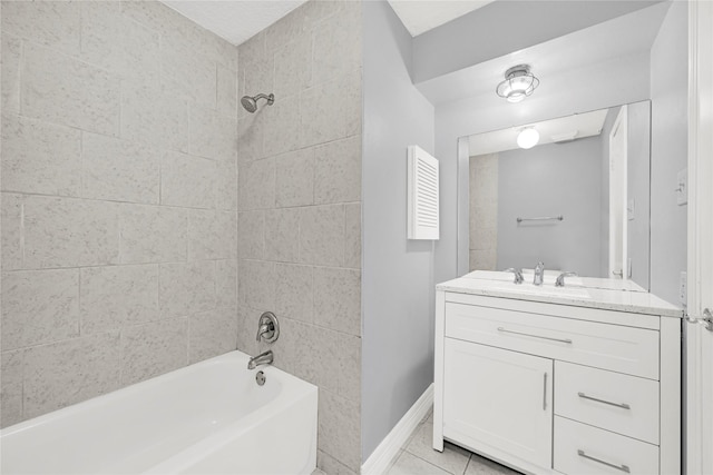 bathroom featuring bathtub / shower combination, tile patterned floors, vanity, and baseboards