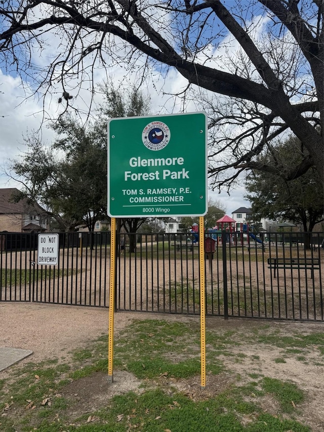 view of community featuring fence