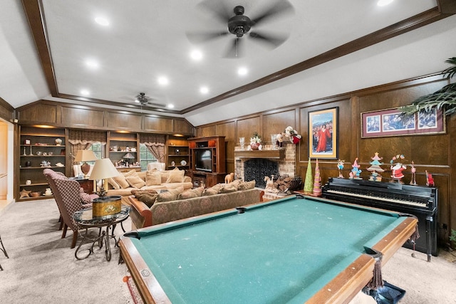 recreation room with crown molding, lofted ceiling, light carpet, and ceiling fan