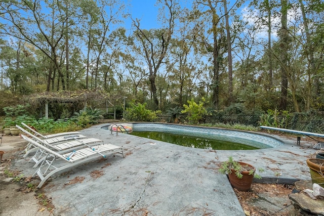 outdoor pool featuring a patio