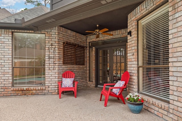 view of patio / terrace with french doors and a ceiling fan