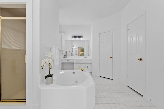 full bathroom featuring a stall shower, tile patterned floors, a tub with jets, and vanity