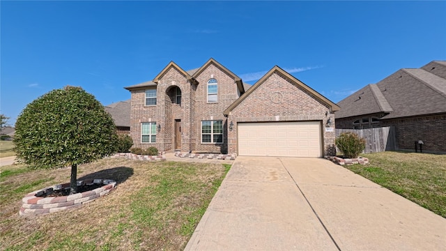 traditional-style home with a garage, driveway, fence, a front lawn, and brick siding