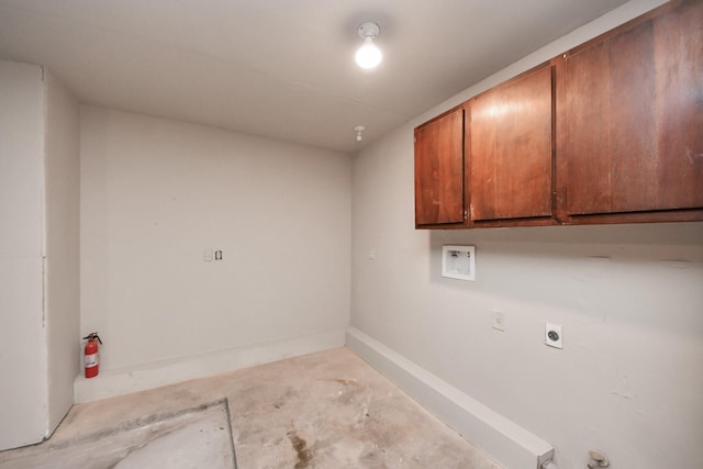 laundry room featuring hookup for a washing machine, cabinet space, baseboards, and electric dryer hookup