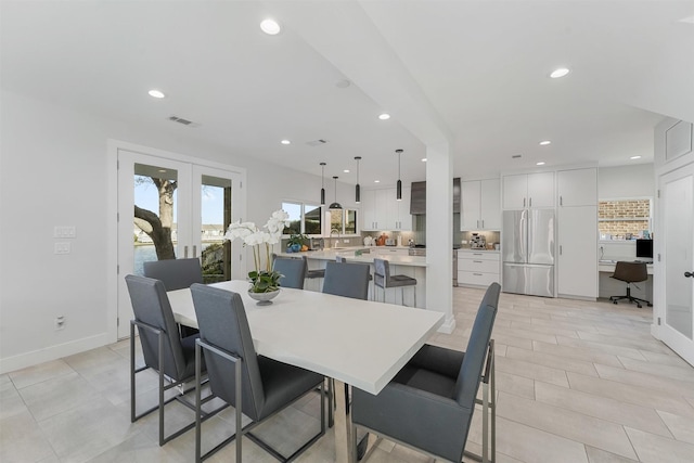 dining room featuring french doors, light tile patterned floors, recessed lighting, visible vents, and baseboards