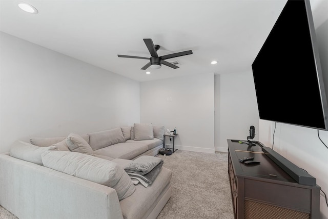 carpeted living area with baseboards, a ceiling fan, and recessed lighting